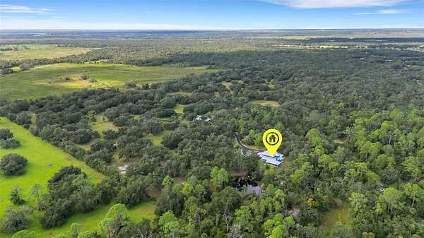 90.7 Acres of Land with Home for Sale in Myakka City, Florida