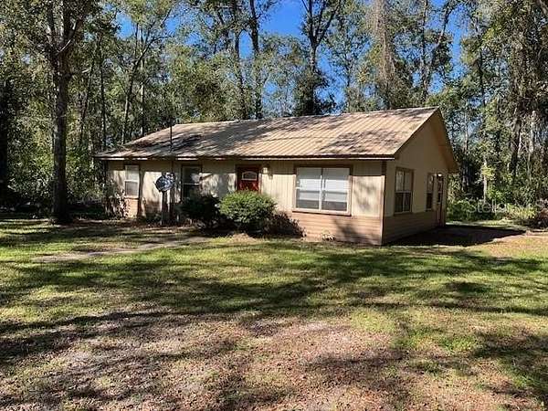 2.9 Acres of Residential Land with Home for Lease in Gainesville, Florida