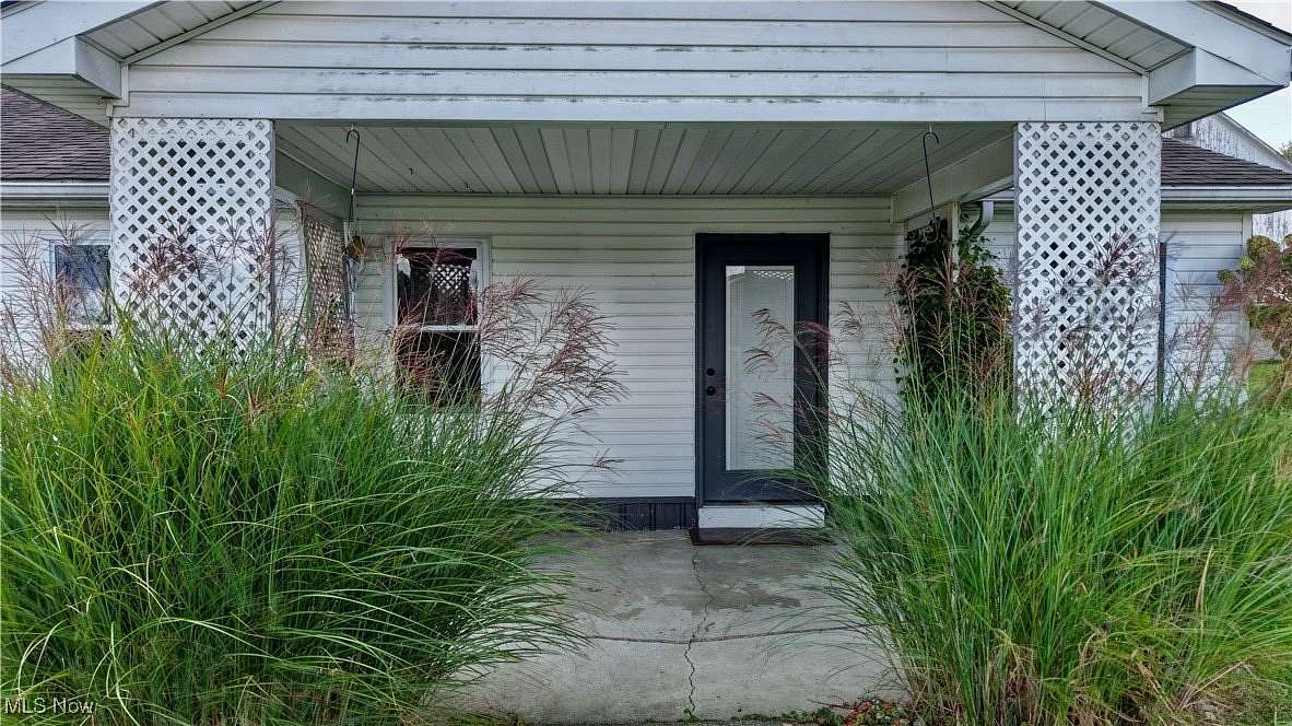 5 Acres of Residential Land with Home for Auction in Middlefield, Ohio