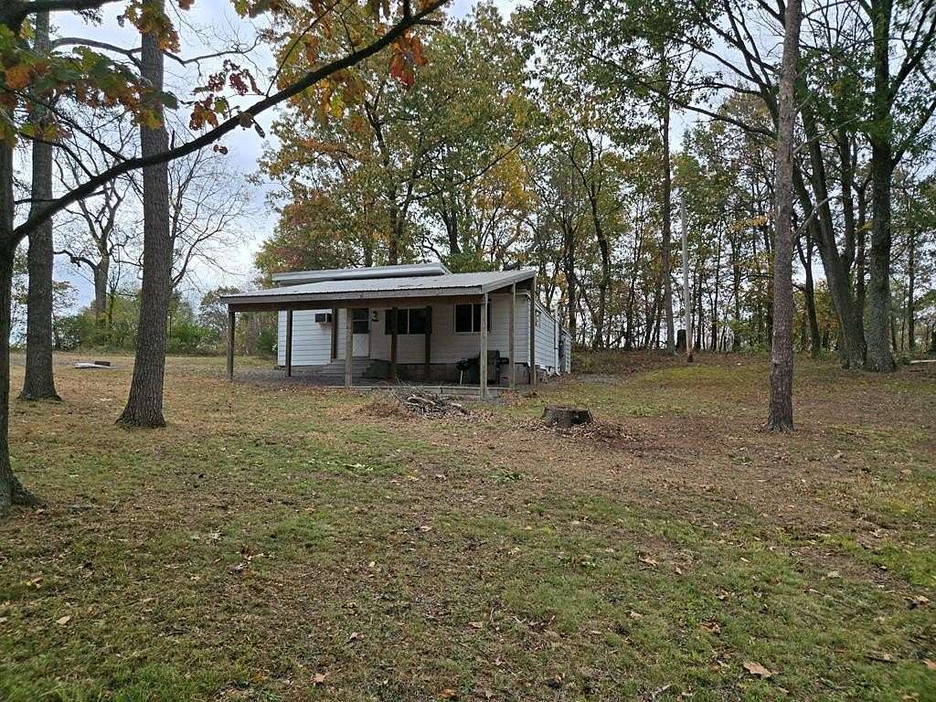 2 Acres of Residential Land with Home for Sale in James Creek, Pennsylvania