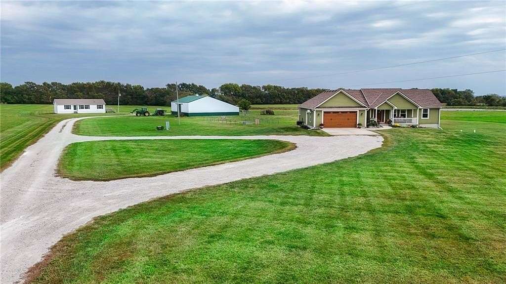 41.4 Acres of Agricultural Land with Home for Sale in Freeman, Missouri