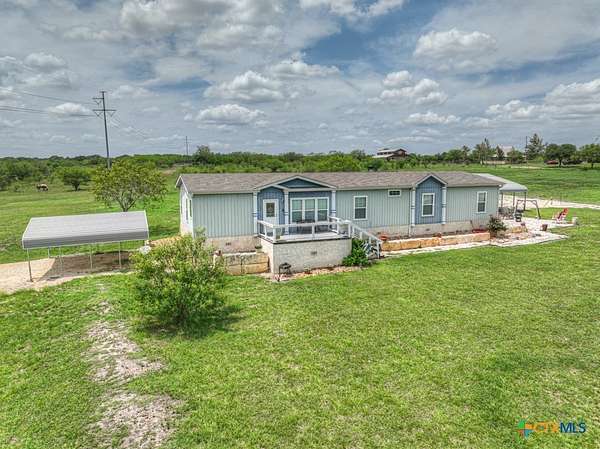 4.6 Acres of Residential Land with Home for Sale in New Braunfels, Texas