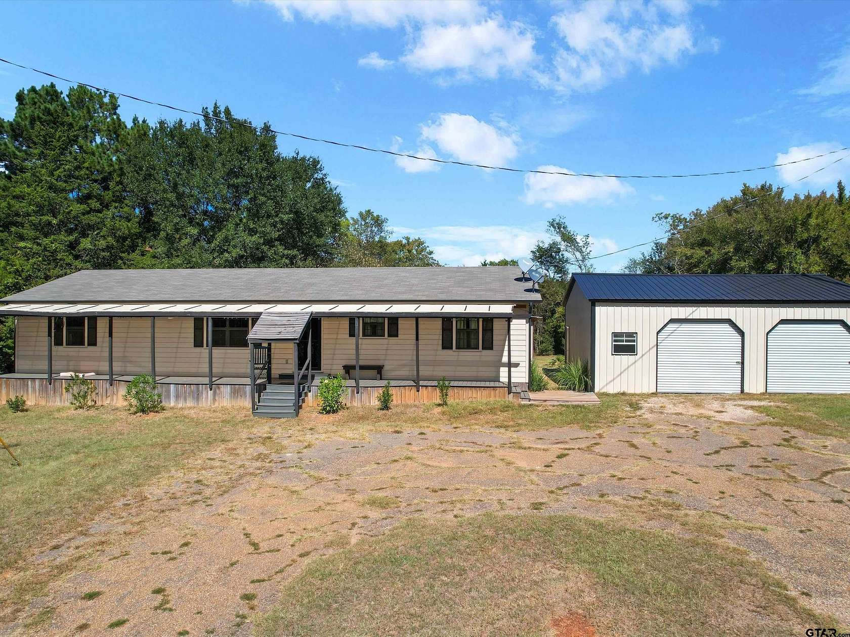 5.5 Acres of Residential Land with Home for Sale in Longview, Texas