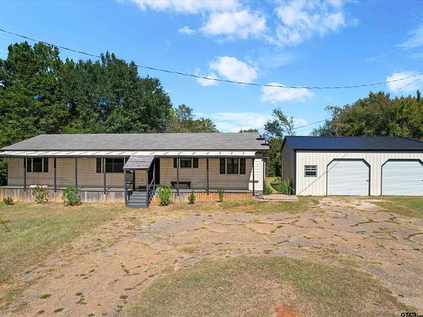 5.5 Acres of Land with Home for Sale in Longview, Texas