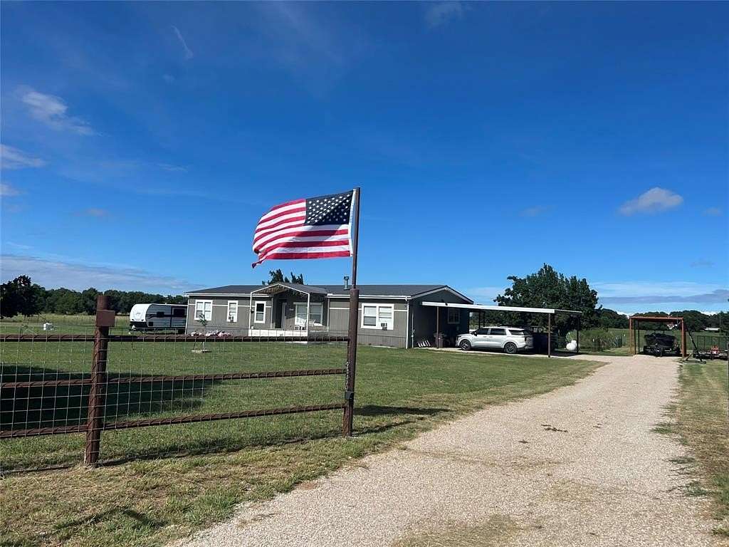 2 Acres of Residential Land with Home for Sale in Loving, Texas