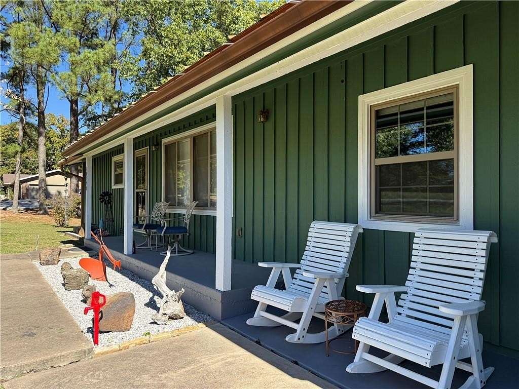 2.48 Acres of Residential Land with Home for Sale in Gravette, Arkansas