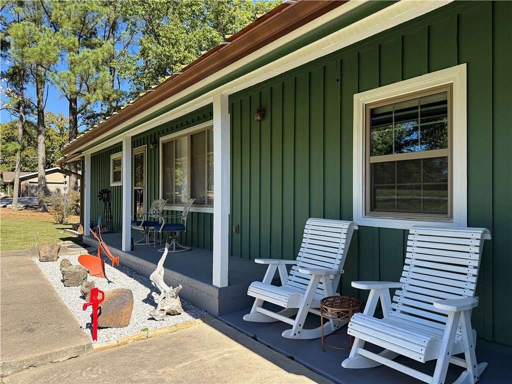 2.48 Acres of Land with Home for Sale in Gravette, Arkansas