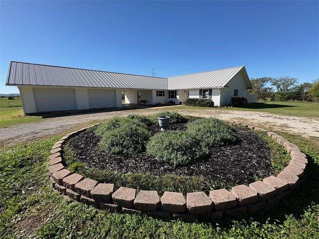 4.64 Acres of Residential Land with Home for Sale in Berryville, Arkansas