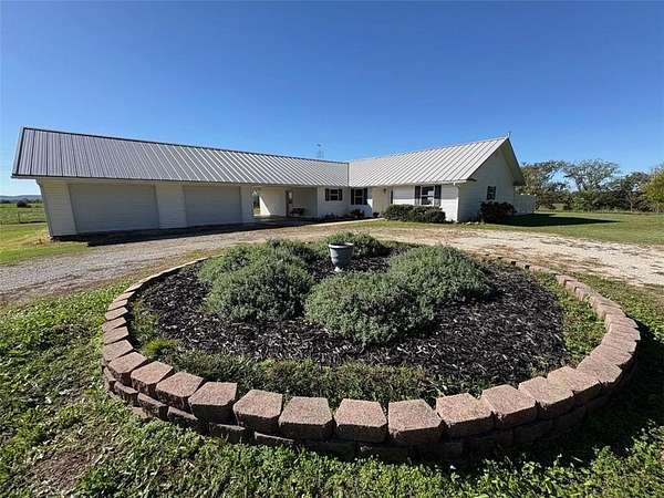 4.64 Acres of Residential Land with Home for Sale in Berryville, Arkansas