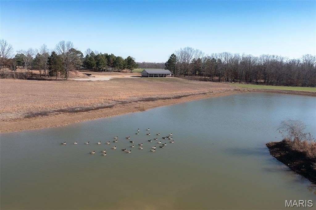 76.8 Acres of Land with Home for Sale in Glen Allen, Missouri