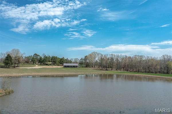 76.8 Acres of Land with Home for Sale in Glen Allen, Missouri