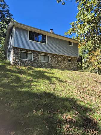 10 Acres of Recreational Land with Home for Sale in Sunrise Beach, Missouri