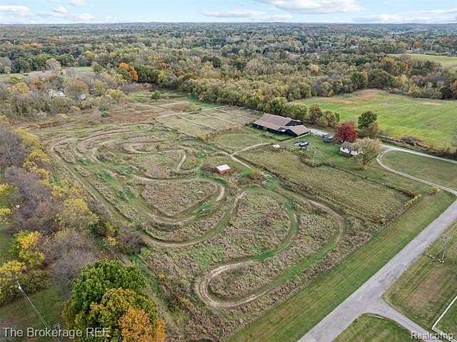 10.2 Acres of Land with Home for Sale in Highland Township, Michigan