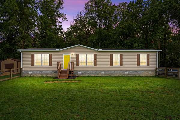 3.1 Acres of Residential Land with Home for Sale in Lyles, Tennessee