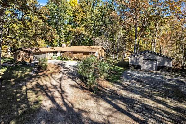 10 Acres of Recreational Land with Home for Sale in Dexter, Michigan