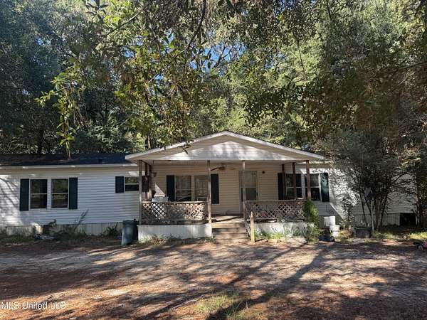 2.9 Acres of Residential Land with Home for Sale in Lucedale, Mississippi