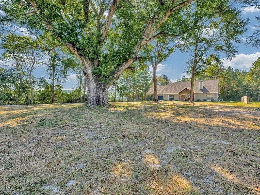 2.2 Acres of Residential Land with Home for Sale in Lufkin, Texas