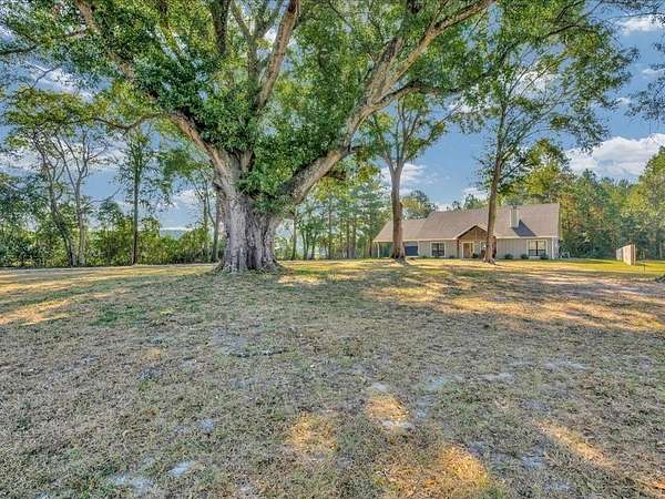 2.2 Acres of Land with Home for Sale in Hudson, Texas