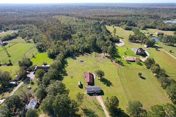 10.2 Acres of Land with Home for Sale in Maurepas, Louisiana