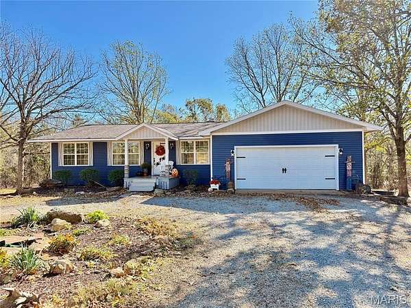 5.37 Acres of Land with Home for Sale in Farmington, Missouri