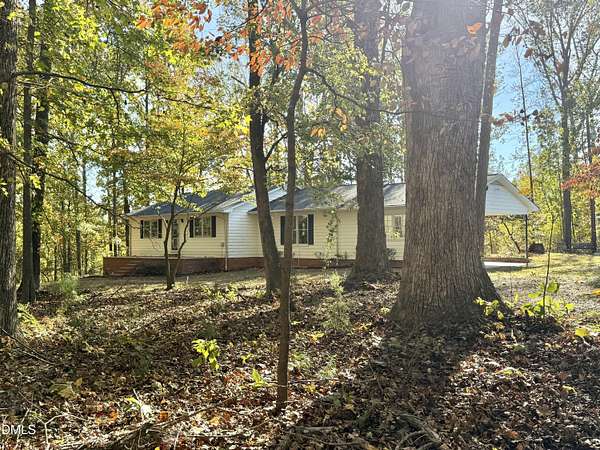 3.1 Acres of Residential Land with Home for Sale in Hurdle Mills, North Carolina