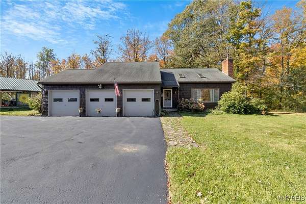 9.5 Acres of Residential Land with Home for Sale in West Falls, New York