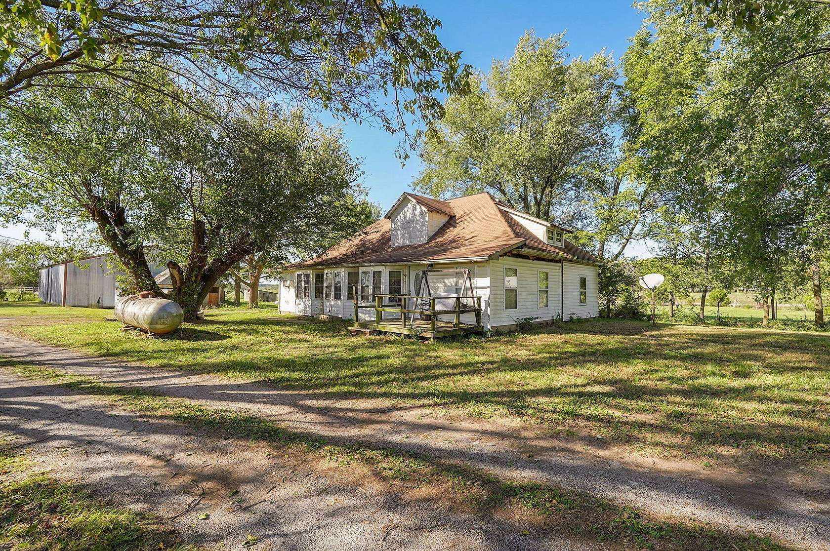 4.4 Acres of Residential Land with Home for Sale in Mount Vernon, Missouri