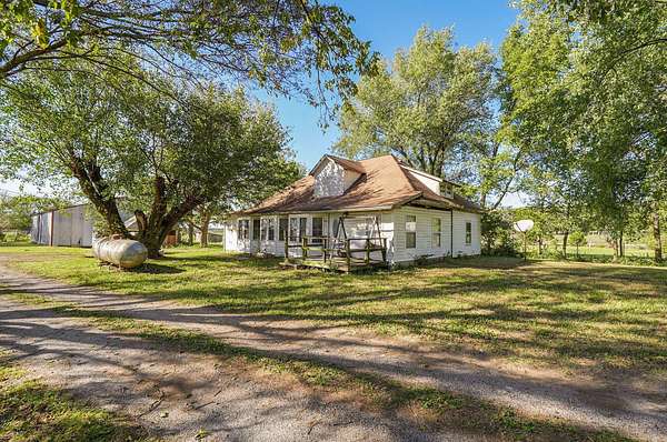 4.4 Acres of Residential Land with Home for Sale in Mount Vernon, Missouri