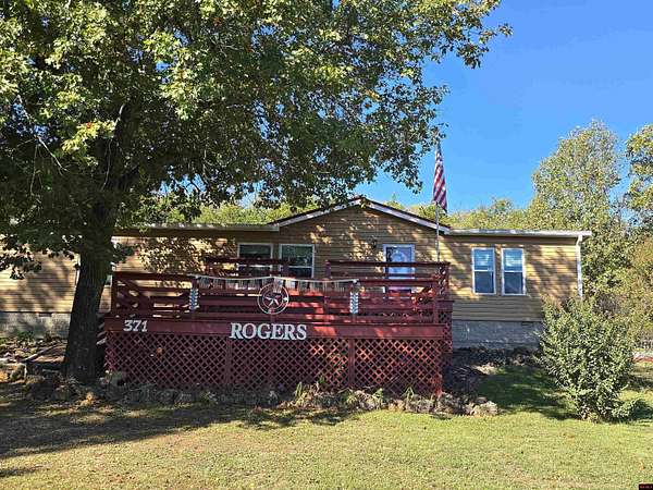 5 Acres of Residential Land with Home for Sale in Flippin, Arkansas