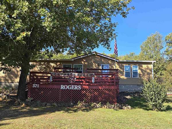 5 Acres of Land with Home for Sale in Flippin, Arkansas