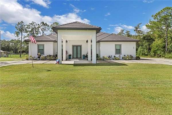 2.5 Acres of Residential Land with Home for Sale in Naples, Florida