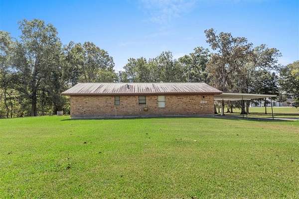 2 Acres of Residential Land with Home for Sale in Welsh, Louisiana