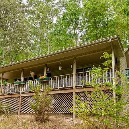 3.67 Acres of Residential Land with Home for Sale in Linden, Tennessee