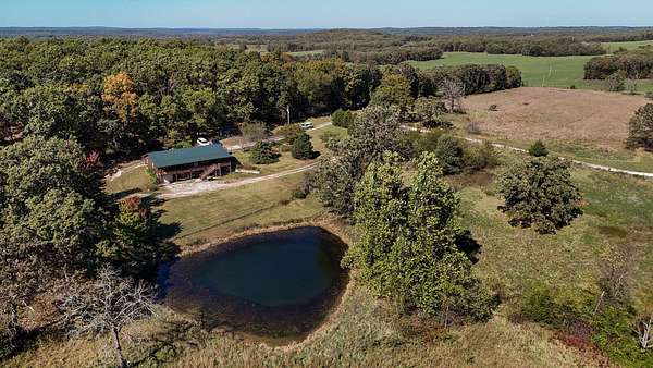 40 Acres of Land with Home for Sale in Humansville, Missouri