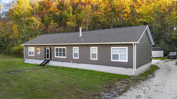 31 Acres of Land with Home for Sale in Salyersville, Kentucky