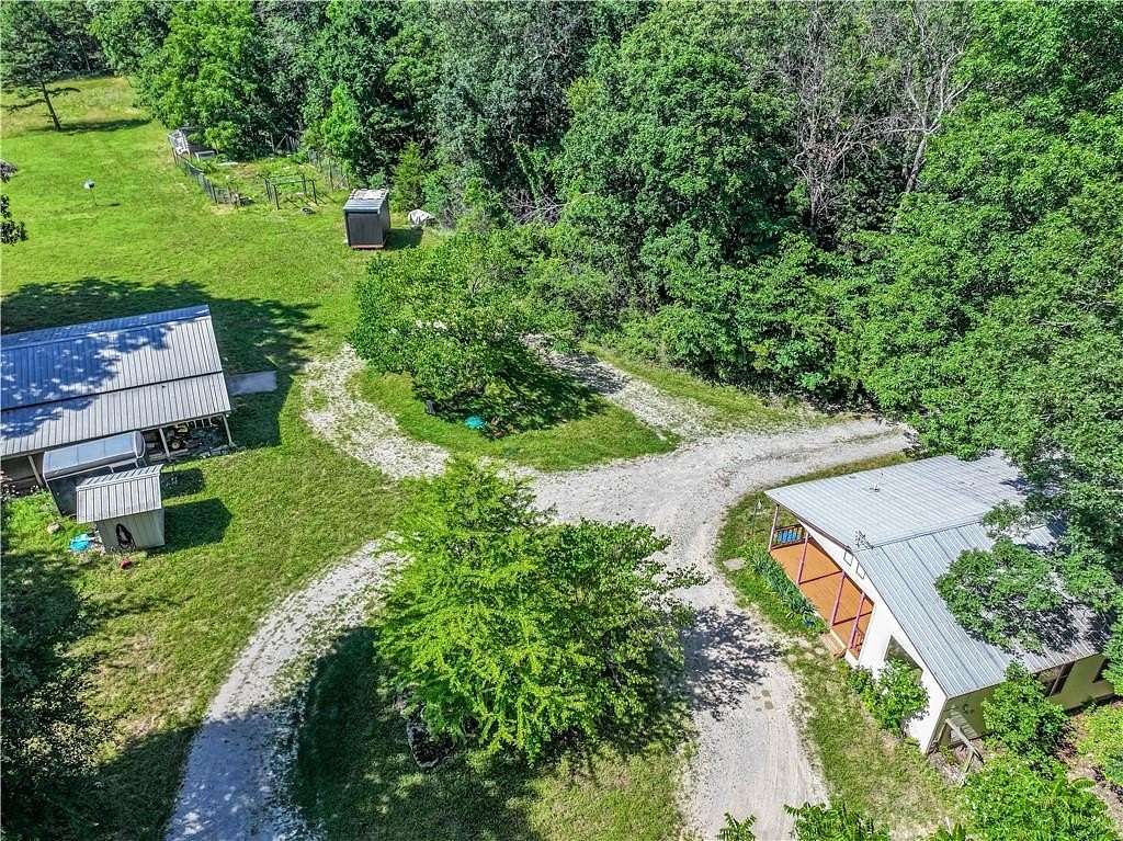 13.6 Acres of Land with Home for Sale in Eureka Springs, Arkansas