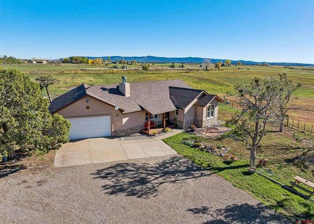 35 Acres of Agricultural Land with Home for Sale in Durango, Colorado