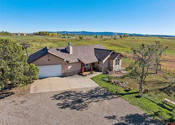 35 Acres of Agricultural Land with Home for Sale in Durango, Colorado