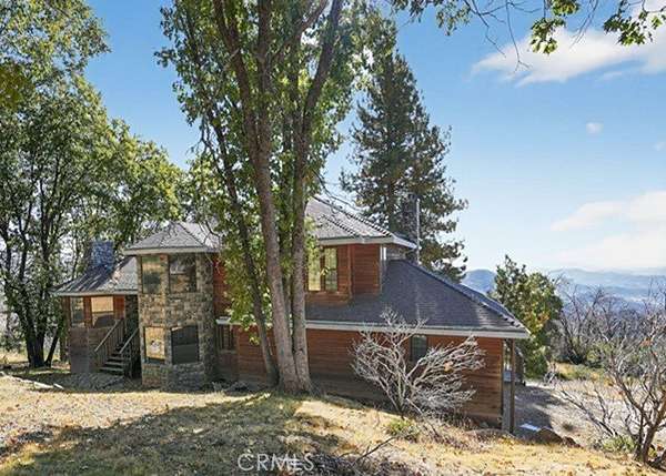 7.27 Acres of Land with Home for Sale in Auberry, California