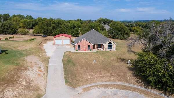 1.53 Acres of Residential Land with Home for Sale in Weatherford, Texas