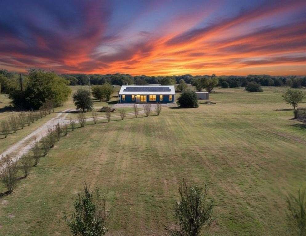7.43 Acres of Land with Home for Sale in Quinlan, Texas