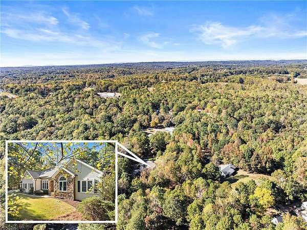 2.43 Acres of Residential Land with Home for Sale in Flowery Branch, Georgia