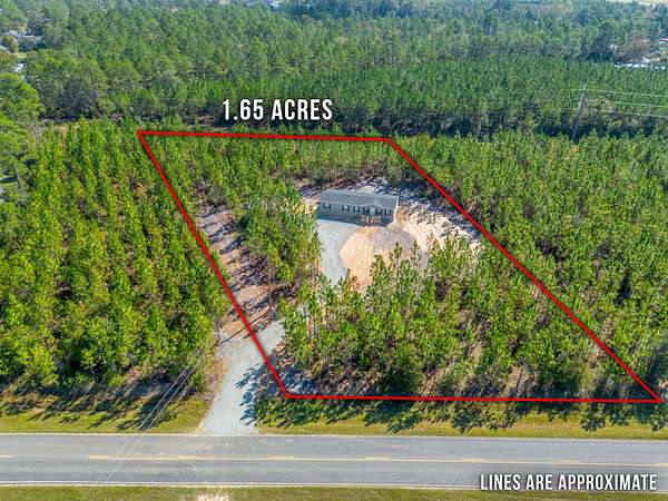 1.65 Acres of Residential Land with Home for Sale in Jesup, Georgia