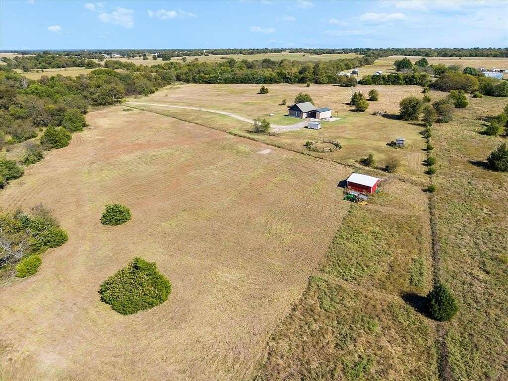 22.2 Acres of Agricultural Land with Home for Sale in Celeste, Texas