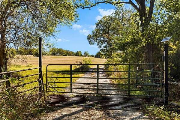 22.2 Acres of Agricultural Land with Home for Sale in Celeste, Texas