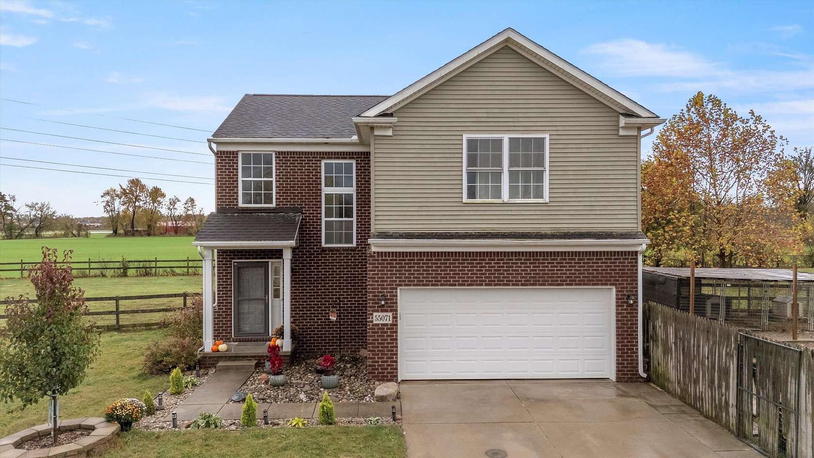 1.89 Acres of Residential Land with Home for Sale in New Hudson, Michigan