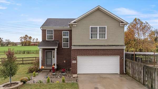 1.89 Acres of Residential Land with Home for Sale in New Hudson, Michigan