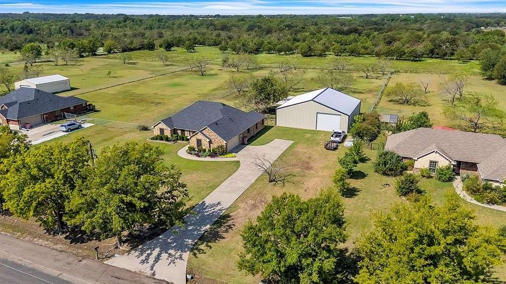 1.5 Acres of Residential Land with Home for Sale in Greenville, Texas