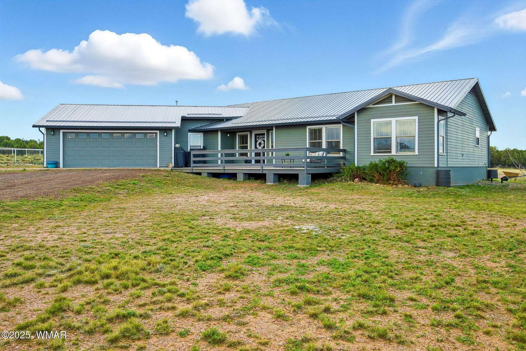 2.5 Acres of Residential Land with Home for Sale in Show Low, Arizona