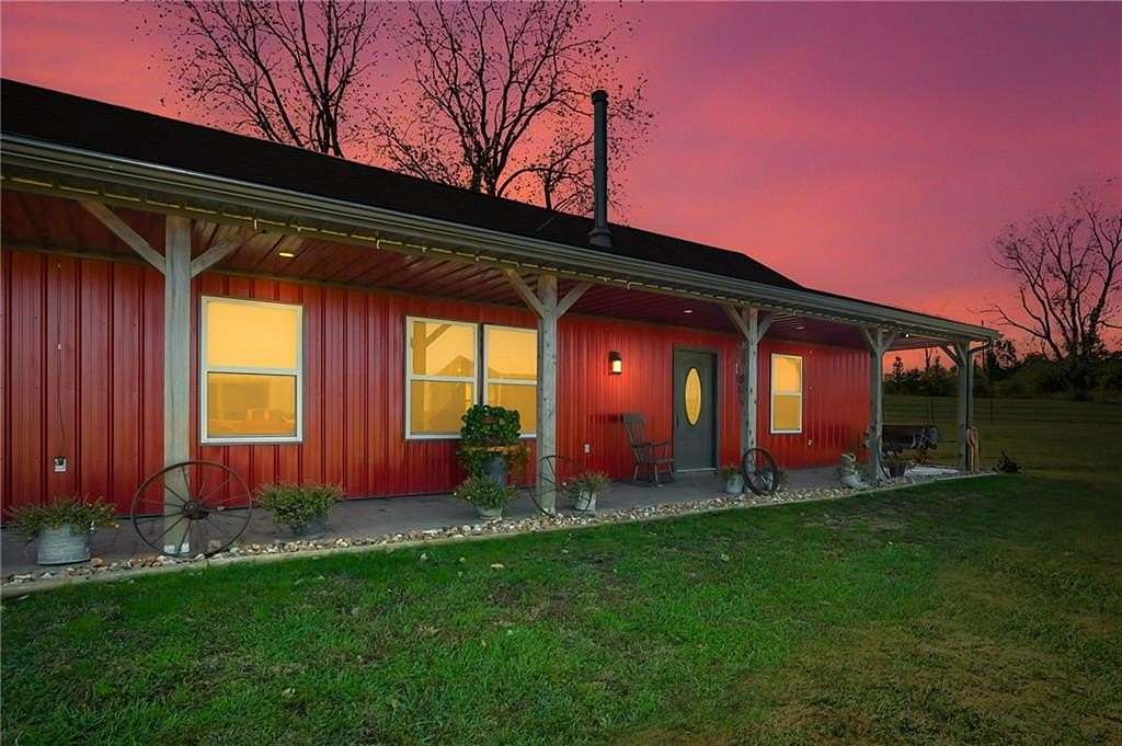 10 Acres of Land with Home for Sale in Holden, Missouri